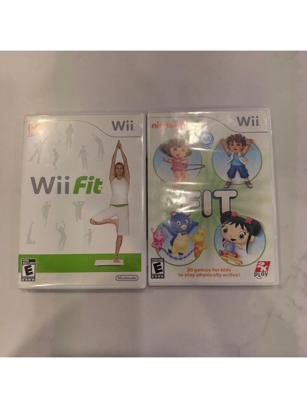 Wii Fit and Nickelodeon Fit Wii Games Bundle
